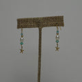 Starfish charm earrings with blue crystals and white freshwater pearls