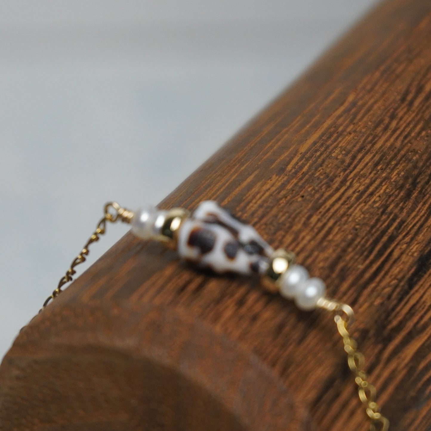 Hebrew Cone Shell and White Button Pearl Floating Fancy Chain Bracelet