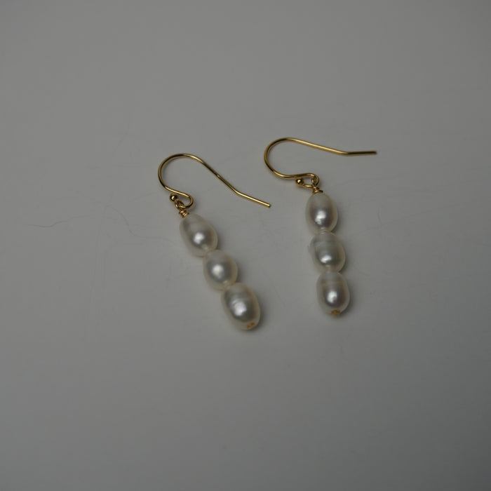 Triple white freshwater pearl drop earrings